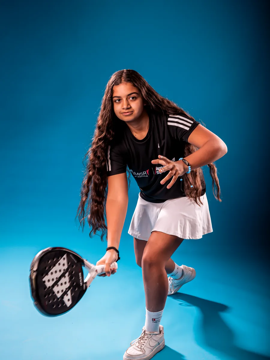 Programme athlete Farida Osman with her racket