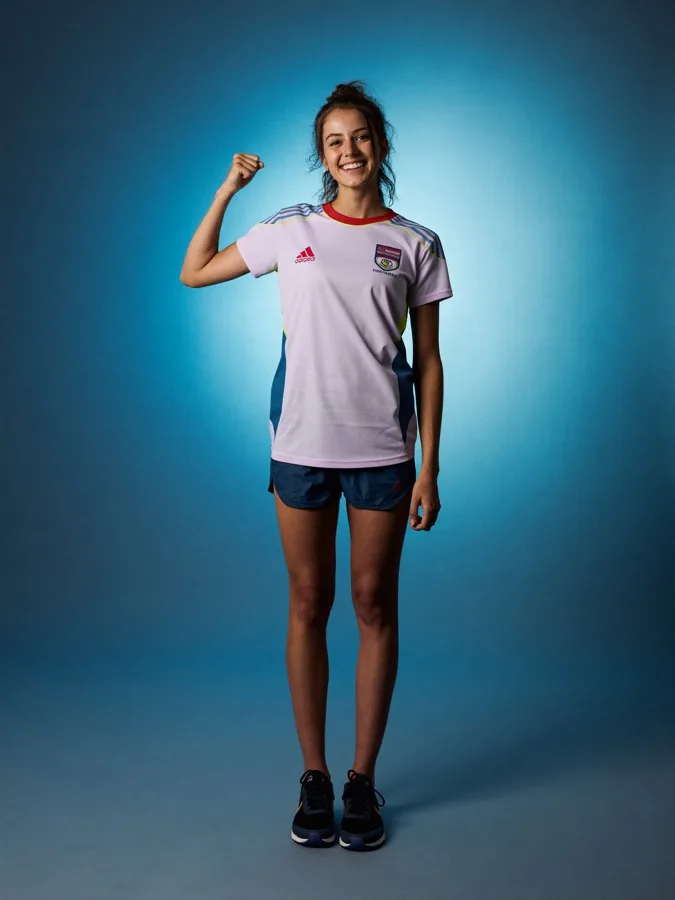 Young athlete celebrating with a raised fist
